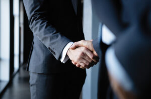 San Jose car accident attorney shaking hand of car accident victims