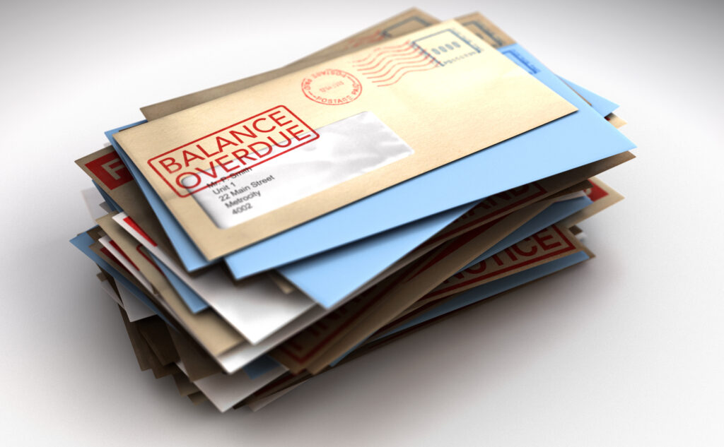 A pile of envelopes with delivery stamps saying balance overdue symbolizing bills and debt on an isolated white background - 3D render